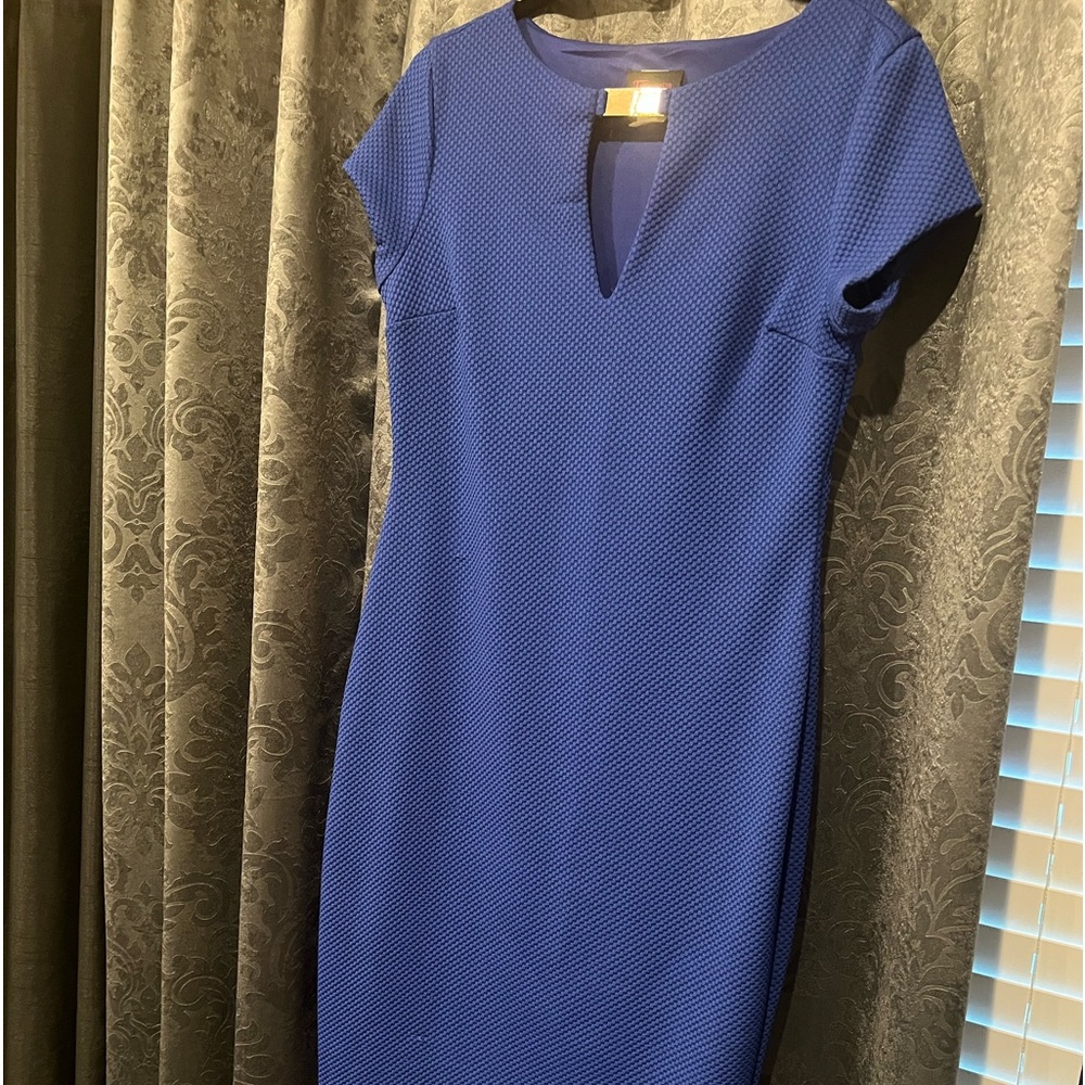 Short sleeve, below the knee dress